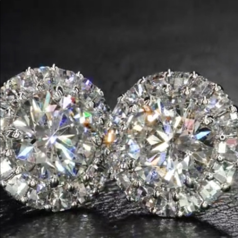0.1  ct  Moissante diamond ,platinum &silver studs